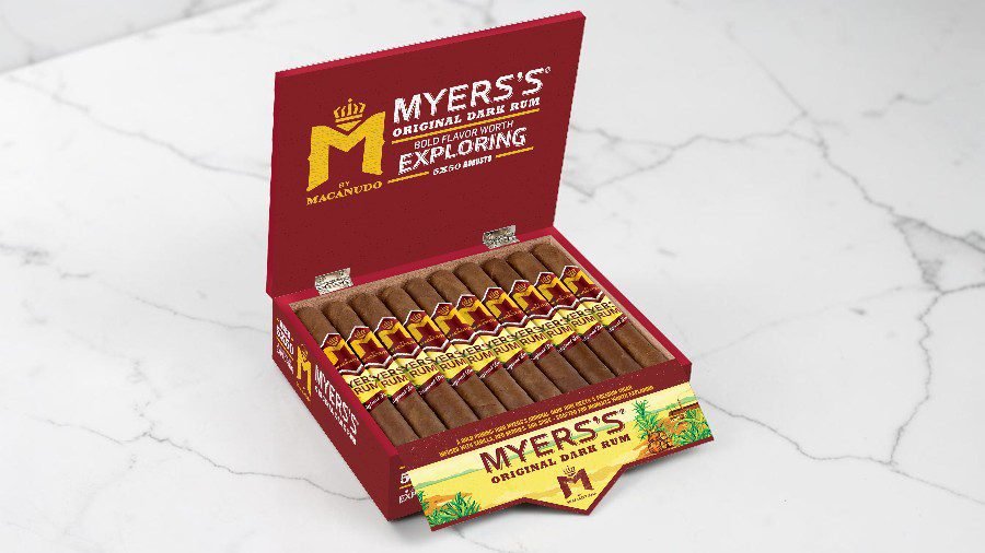 M by Macanudo and Myers's Rum flavor-infused collaboration cigar next to a glass of dark rum